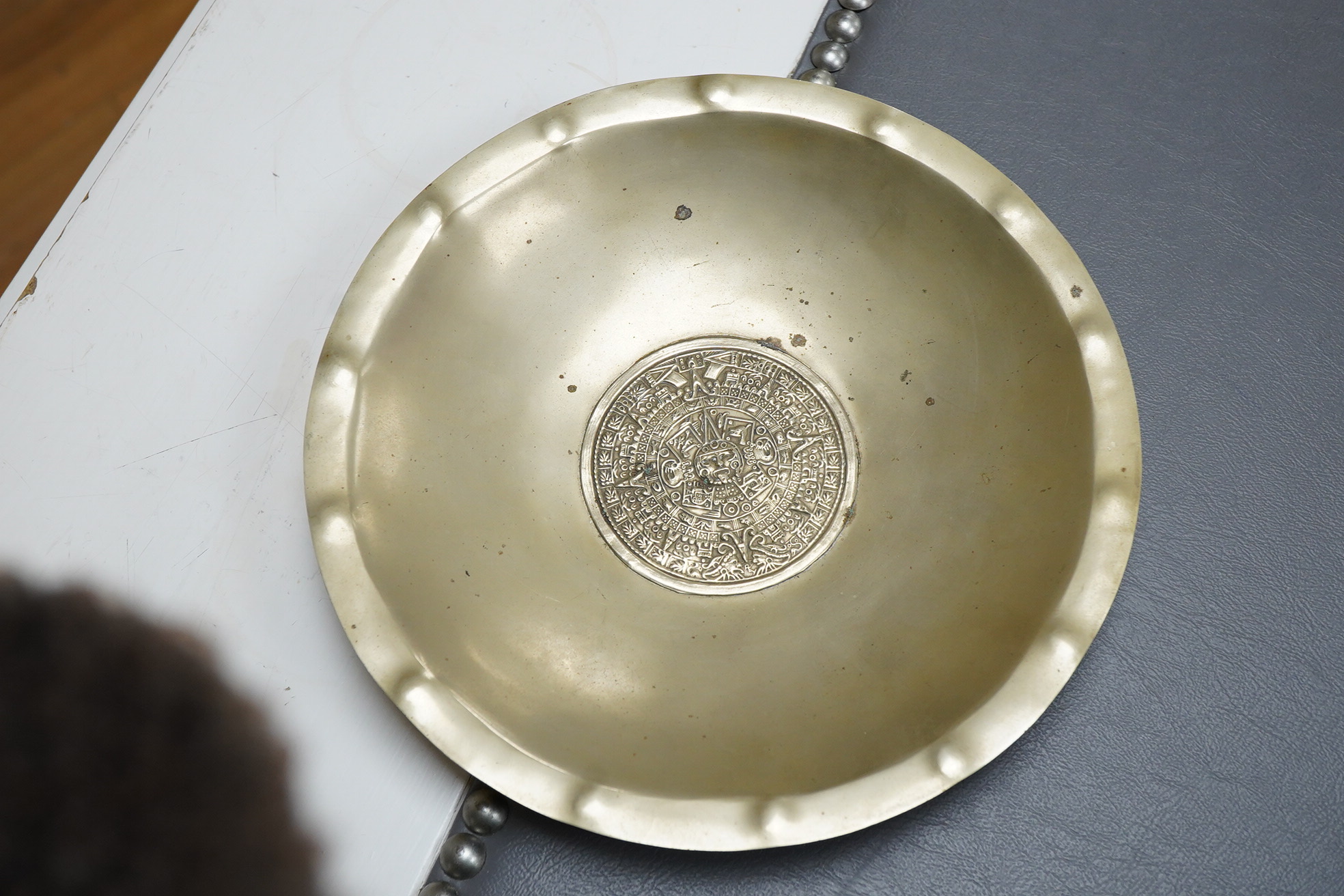 A Mexican sterling 925 dish, the centre embossed with the Aztec Sun Stone, diameter 18.7cm, 6.7oz.